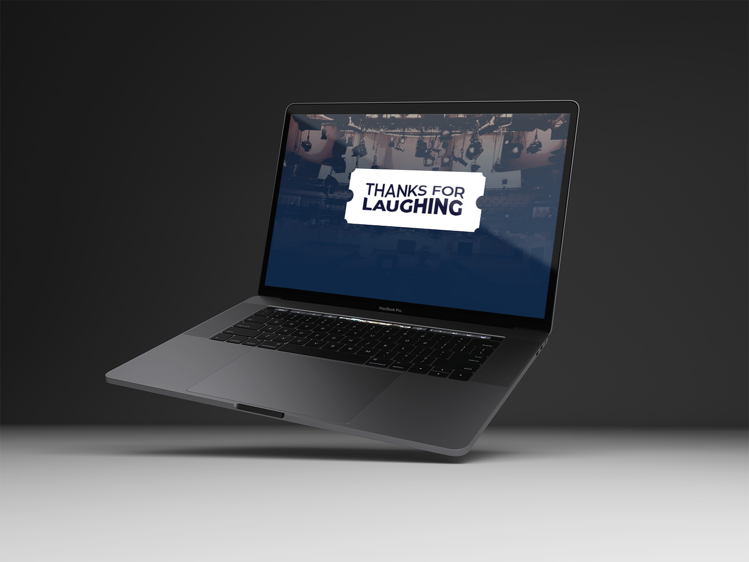 Thanks for Laughing Website mockup on a Macbook Pro.