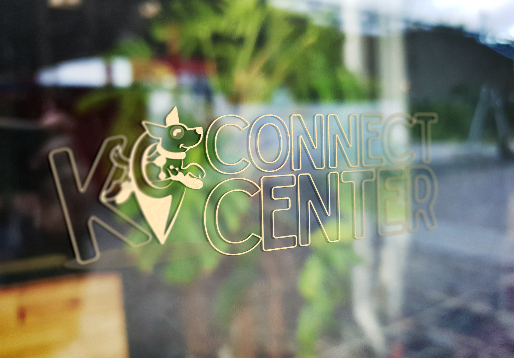 K9 Connect Center logo in gold lettering on a window